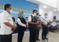 MI/Dwi Apriani Gubernur Sumatra Selatan Herman Deru (tengah) meminta pemerintah pusat agar mengizinkan aktivitas mudik lebaran tahun ini.