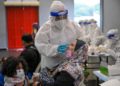 Angka Kematian Covid-19 Tinggi, Nakes Malaysia Kewalahan
